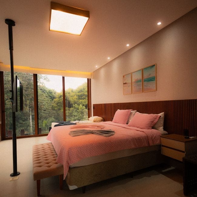 Made bed in a clean bedroom